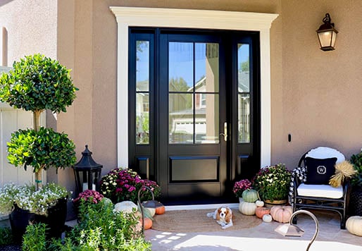 colorful home front entrance with dark andersen door